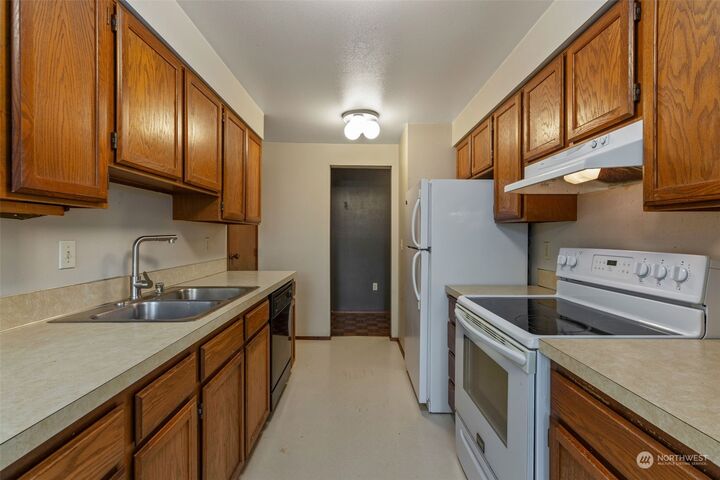 Property Photo:  3560 Narrows View Lane NE 103  WA 98310 