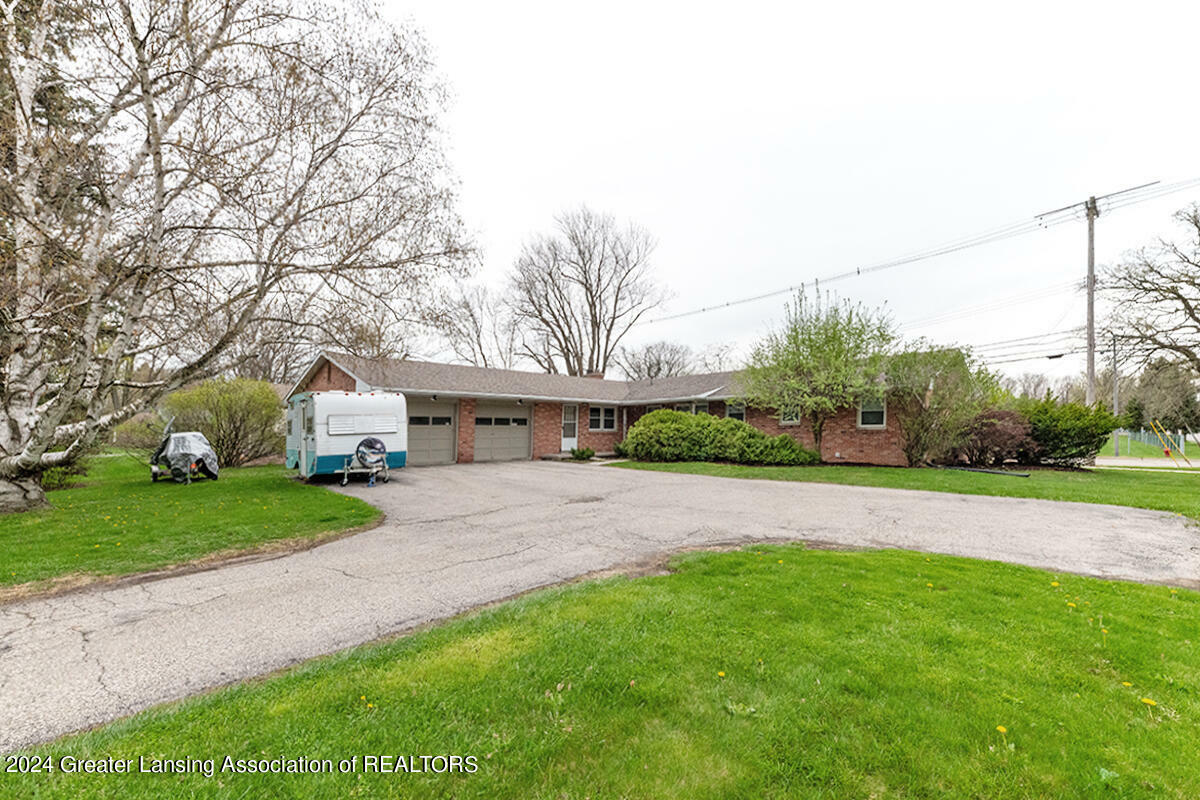 Property Photo:  1500/1512 Woodside Drive  MI 48823 