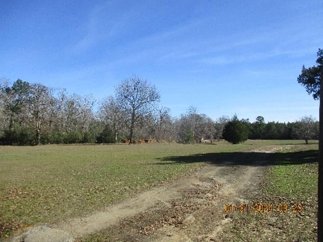 Property Photo:  1142 Cr 4048  TX 77596 
