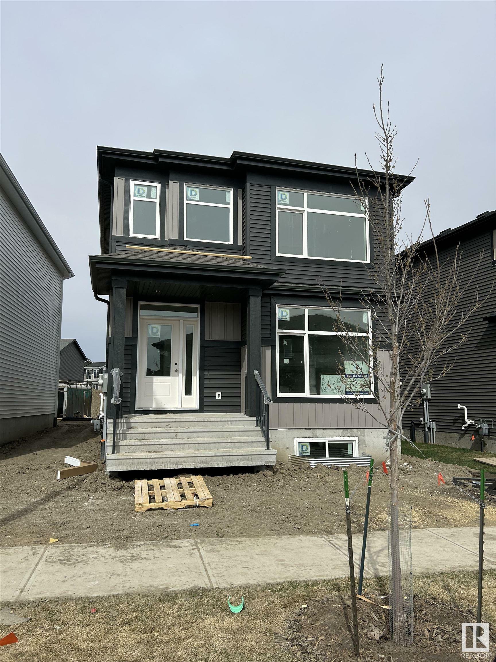 Property Photo:  772 Cy Becker Drive NW  AB T5Y 0W3 