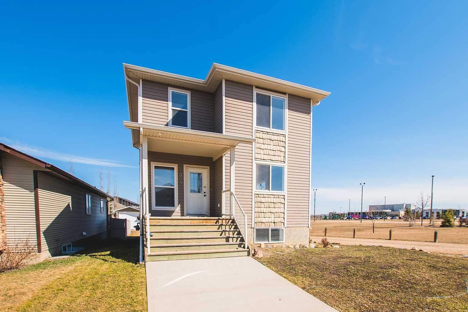 Property Photo: 304 Timothy Drive AB T4P 0K8