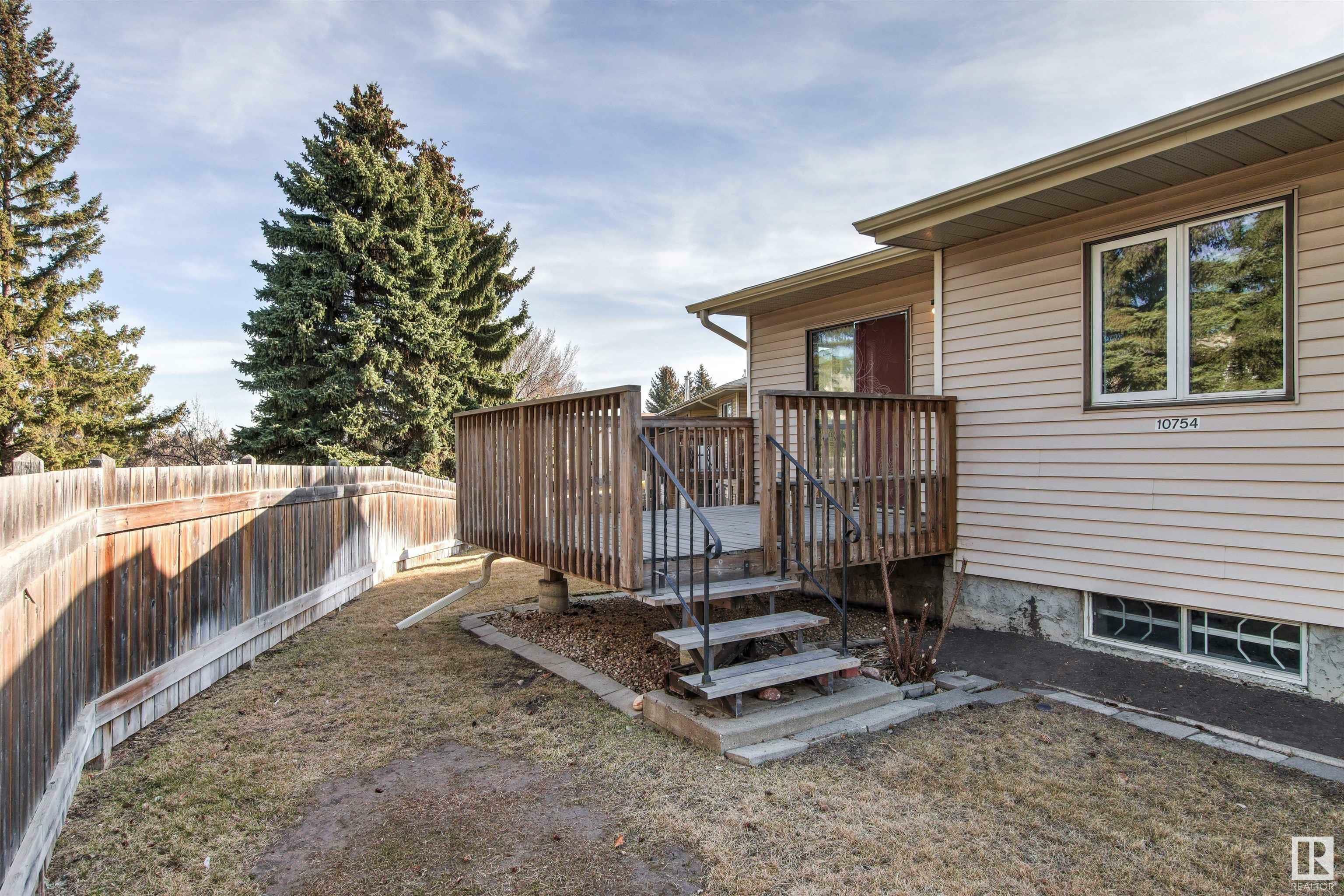 Property Photo:  10754 153 Avenue NW  AB T5X 5T8 