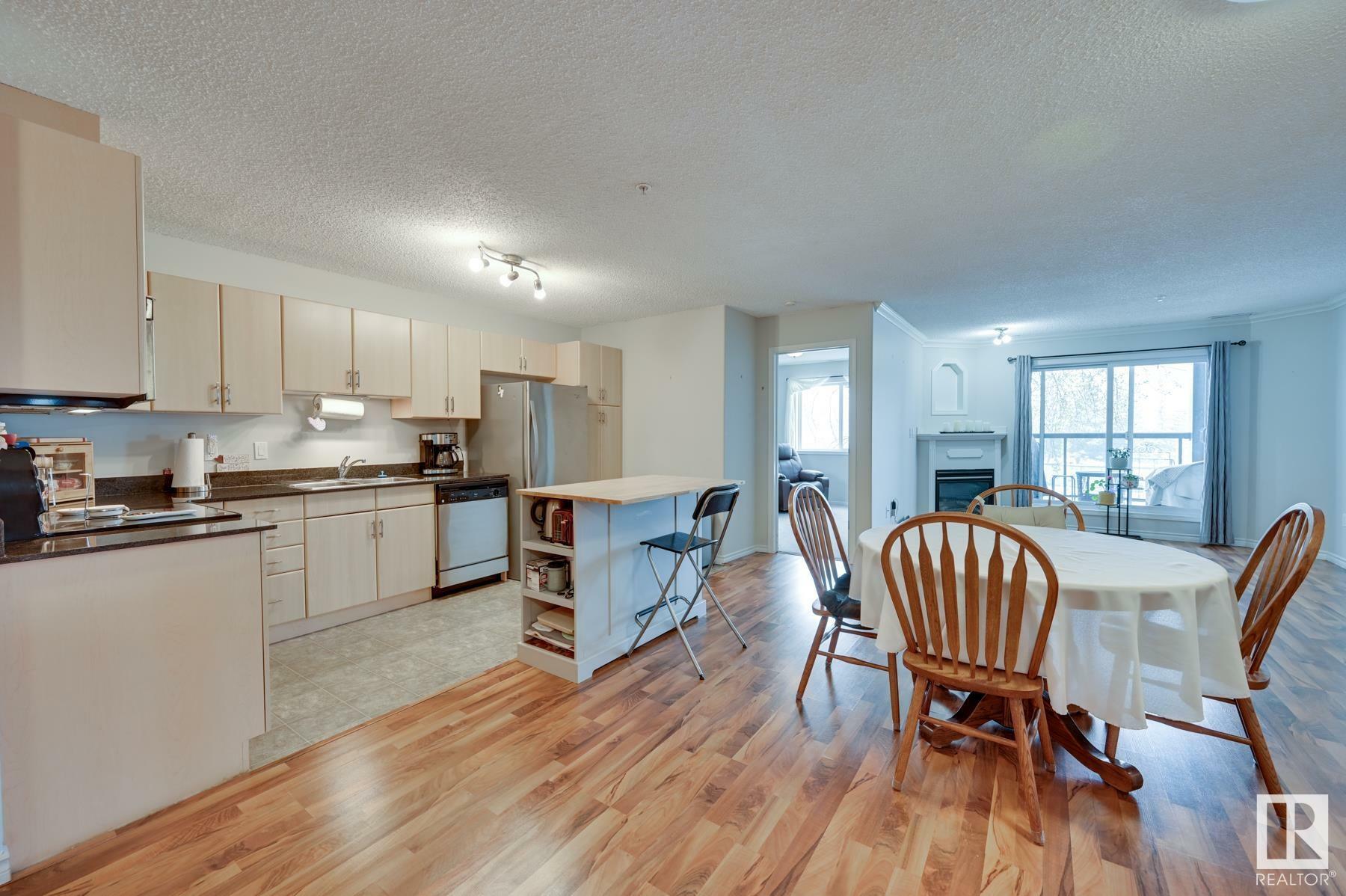 Property Photo:  279 Suder Greens Drive NW 112  AB T5T 6X6 