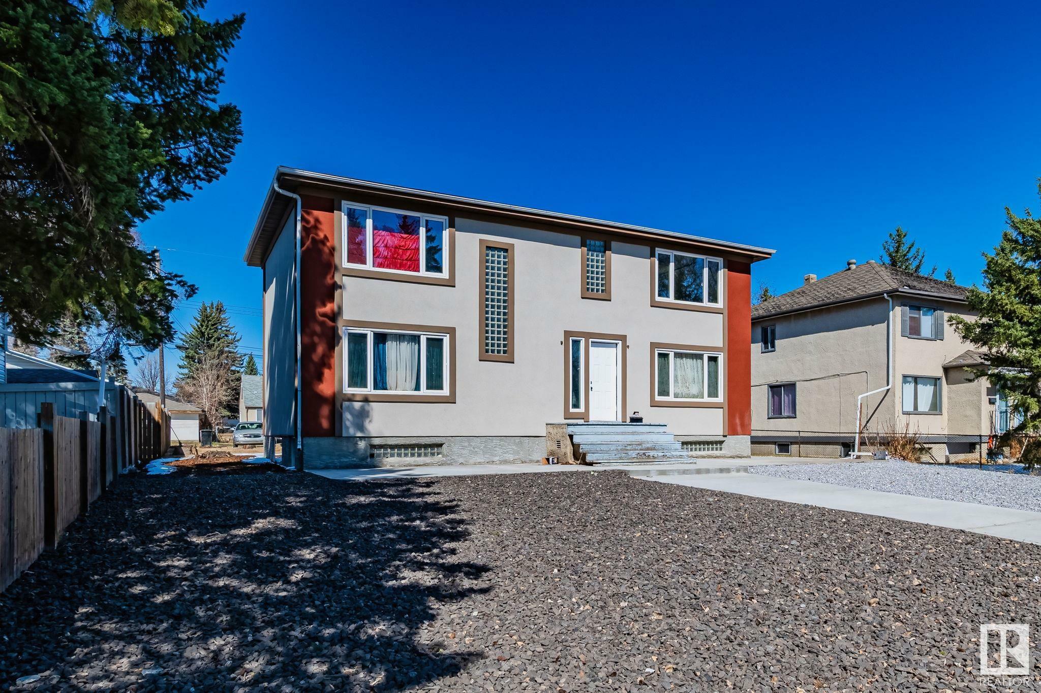 Property Photo:  11306 109A Avenue NW  AB T5H 1G8 