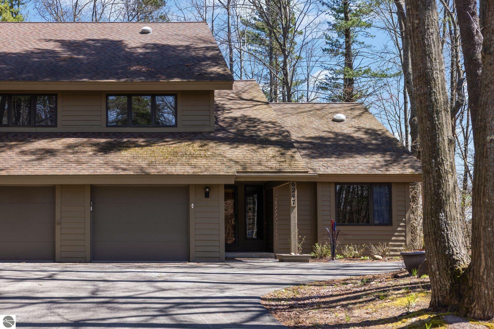 Property Photo:  6247 Summit Court  MI 49686 