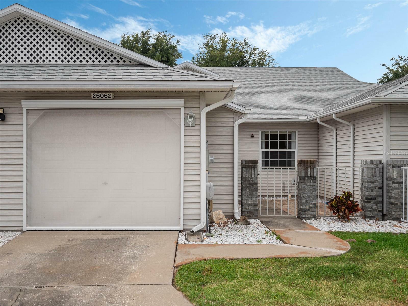 Property Photo:  26062 Newcombe Circle  FL 34748 