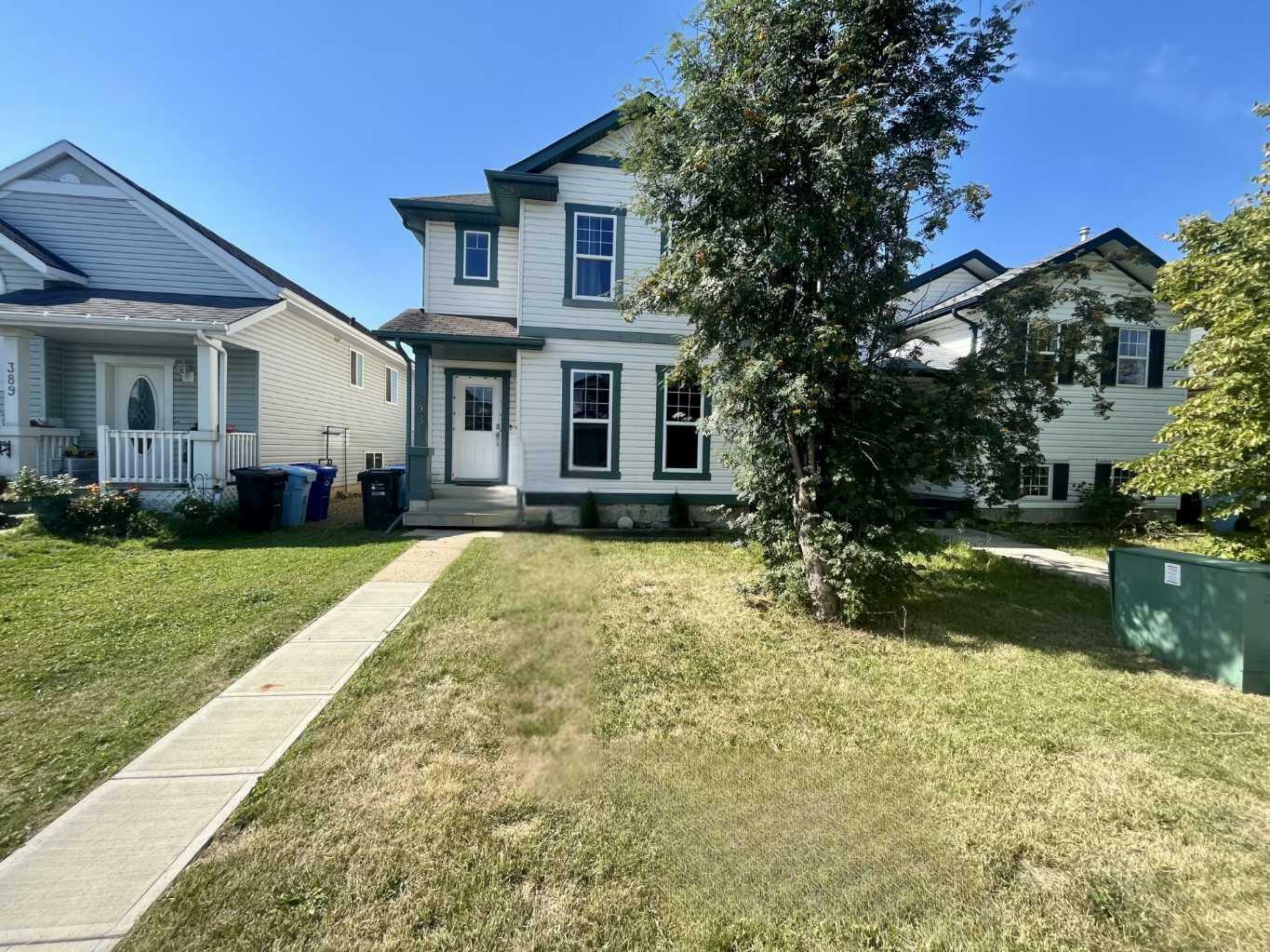 Property Photo:  393 Diefenbaker Drive  AB T9K 2K3 