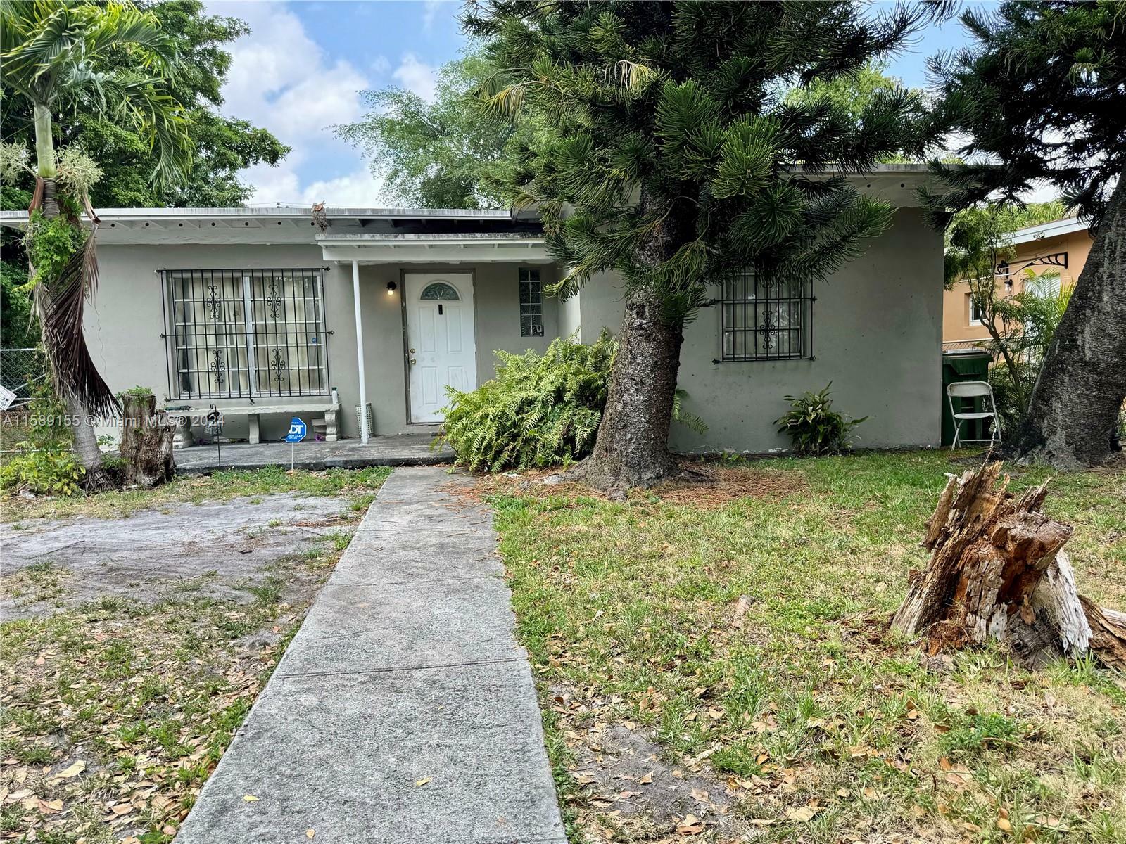 Property Photo:  1255 NW 121st St  FL 33167 