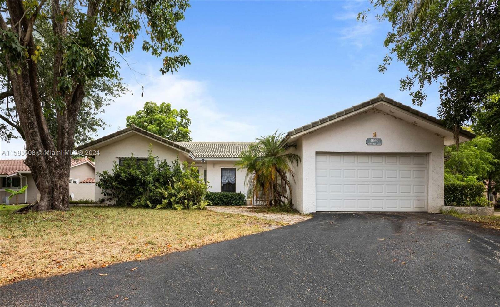 Property Photo:  4060 NW 115th Ave  FL 33065 