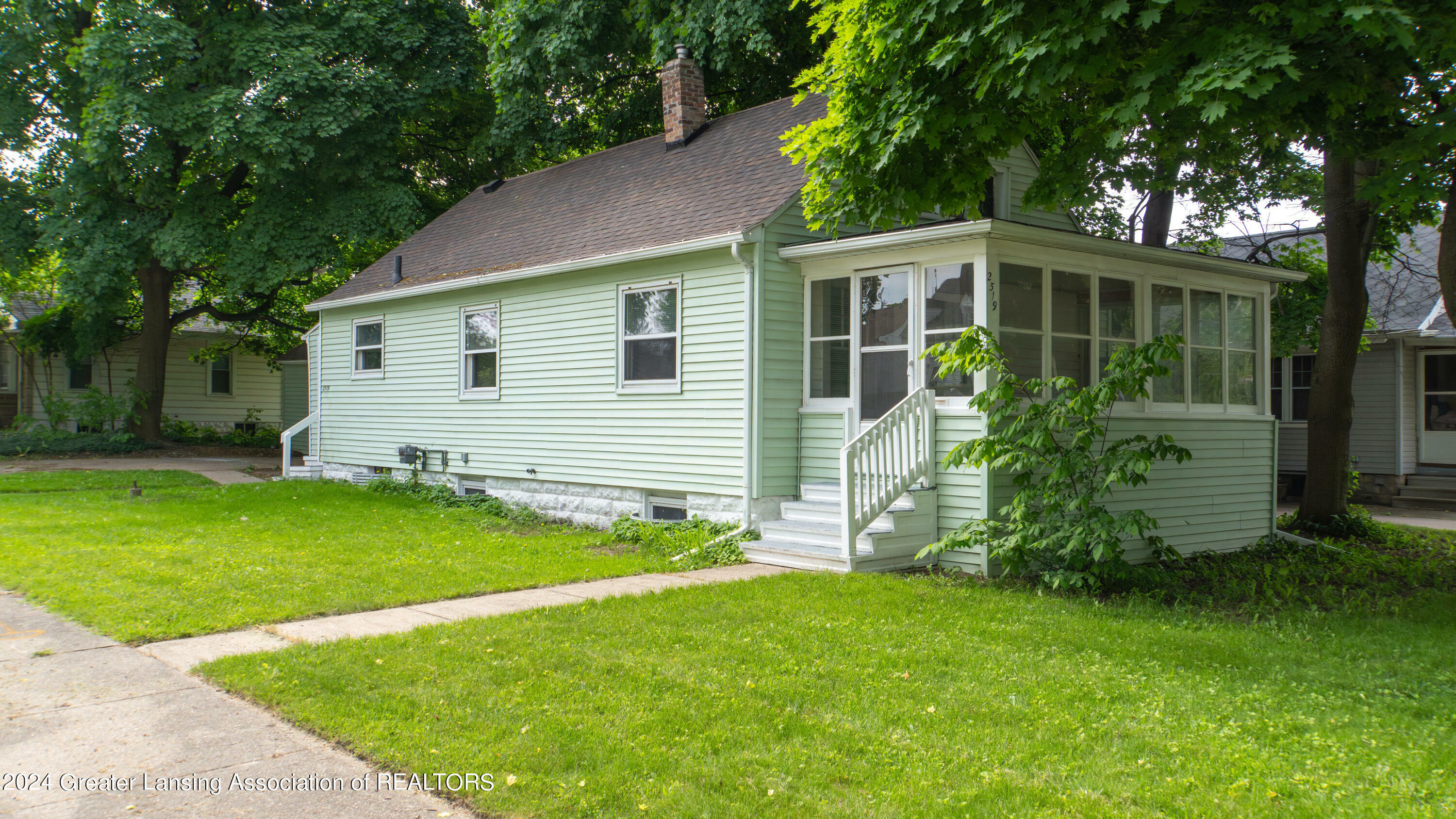 Property Photo:  2519 S Washington Avenue  MI 48910 