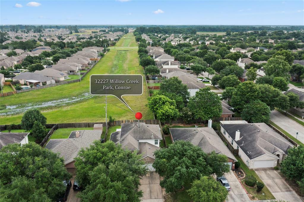 Property Photo: 32227 Willow Creek Park TX 77385