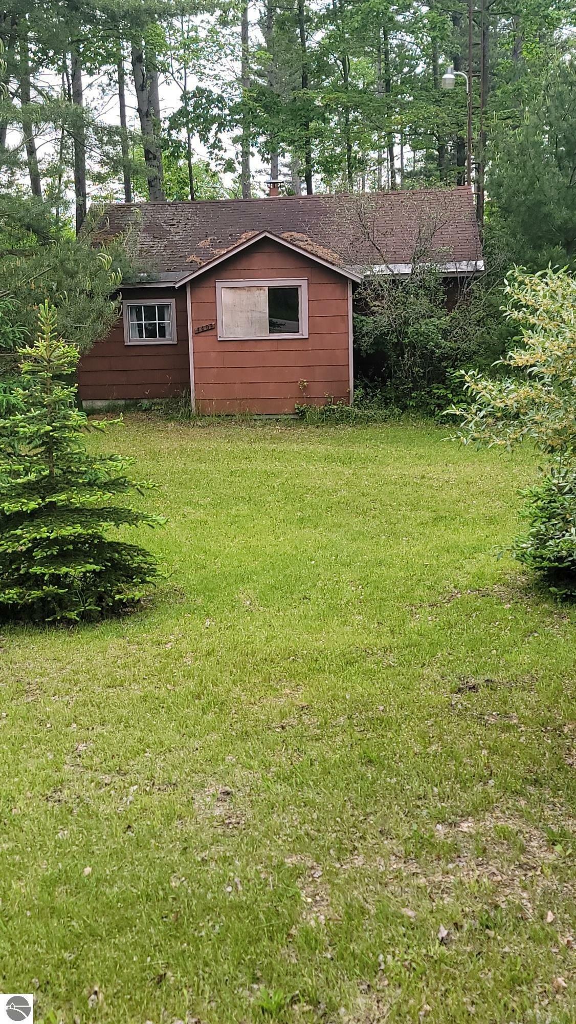 Property Photo:  4409 N Hinkley Road  MI 49651 