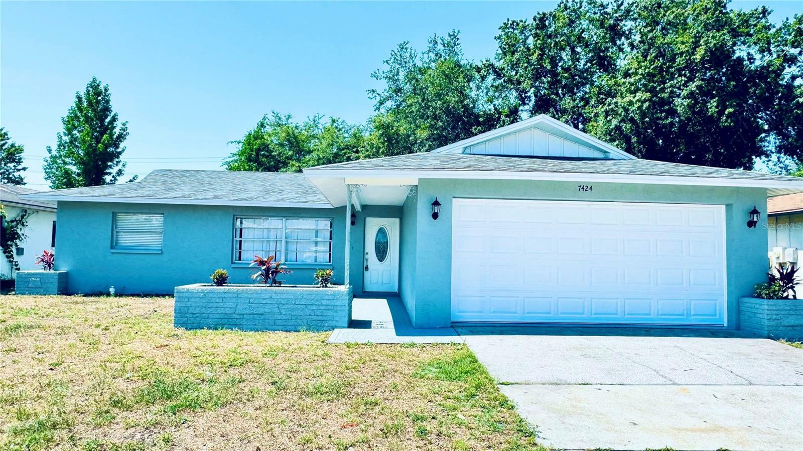 Property Photo: 7424 Isle Drive FL 34668