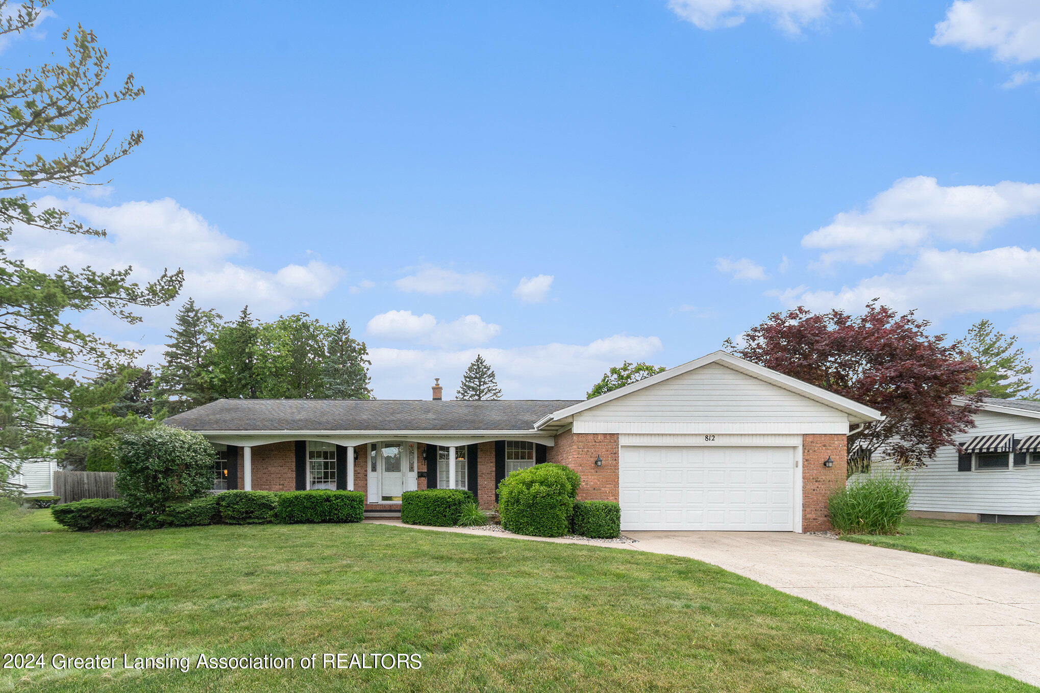 Property Photo:  812 Ledge-Moor Boulevard  MI 48837 