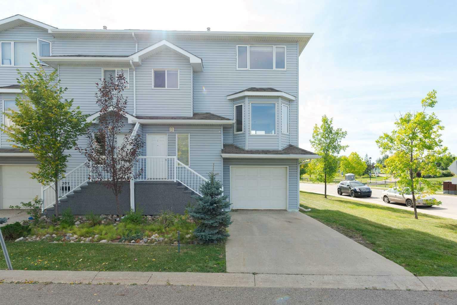 Property Photo:  104 Loutit Road 307  AB T9K 0A2 