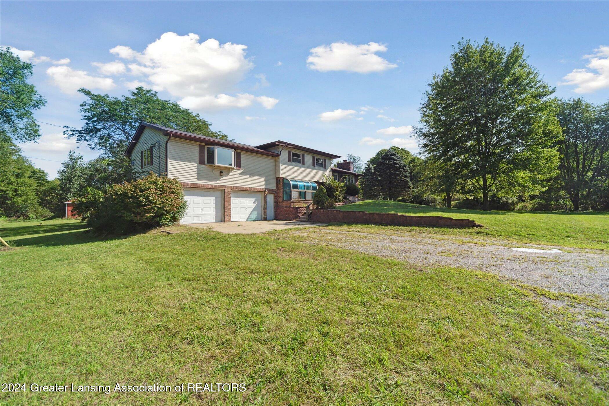 Property Photo:  6099 Sleight Road  MI 48808 