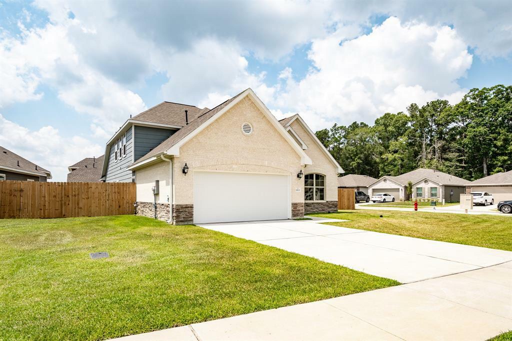 Property Photo: 10610 Ellerston Road TX 77327