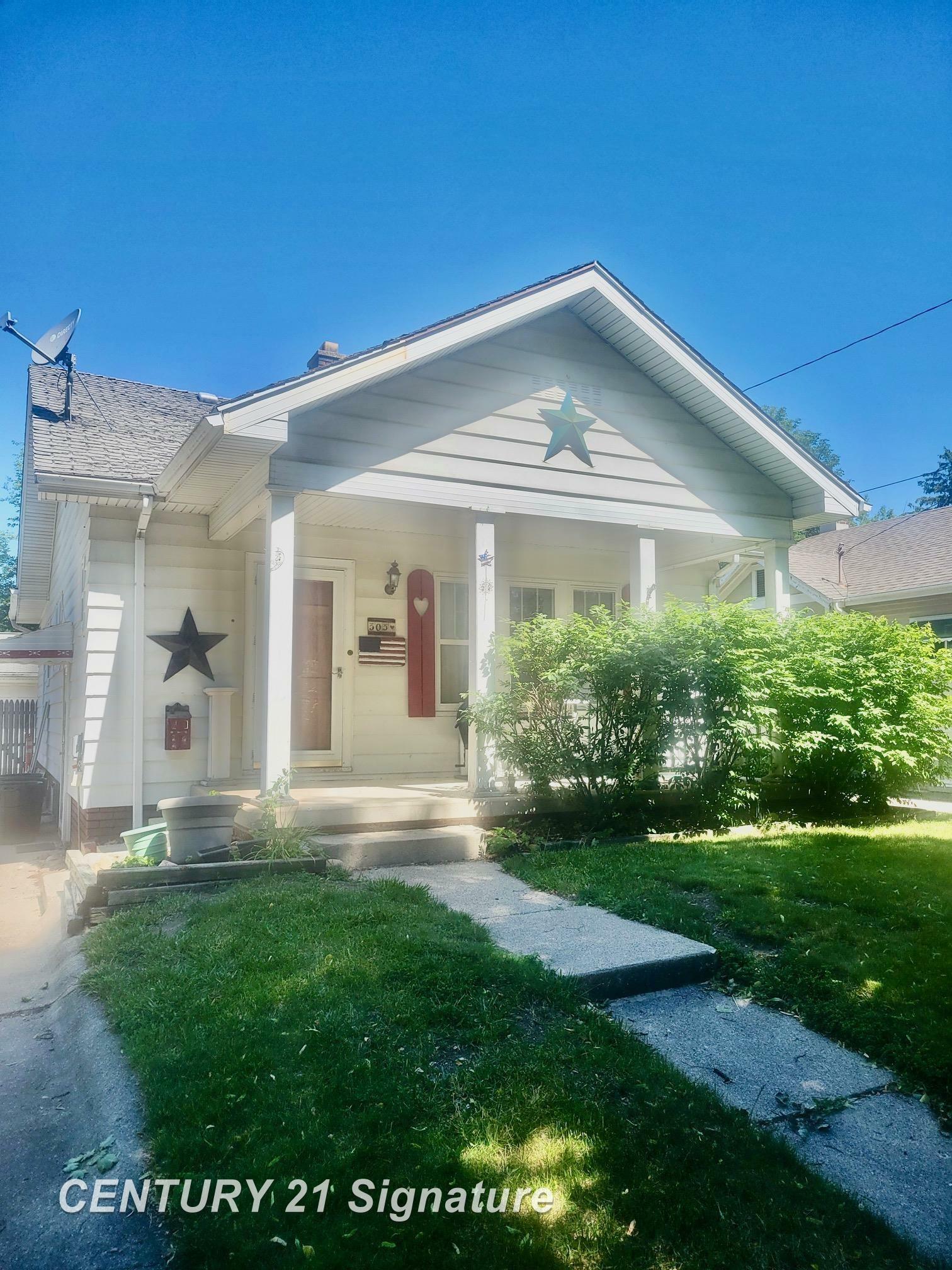 Property Photo:  303 S Alexander Street  MI 48602 