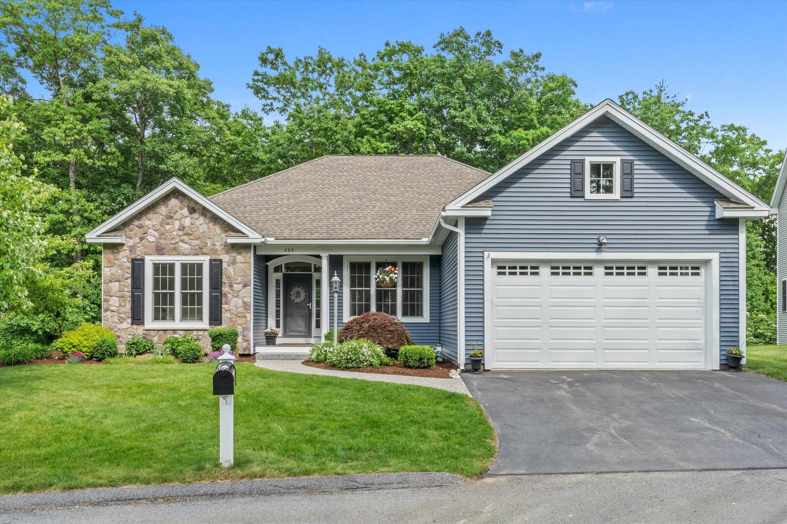 Property Photo:  205 Pleasant Pond Way  NH 03102 