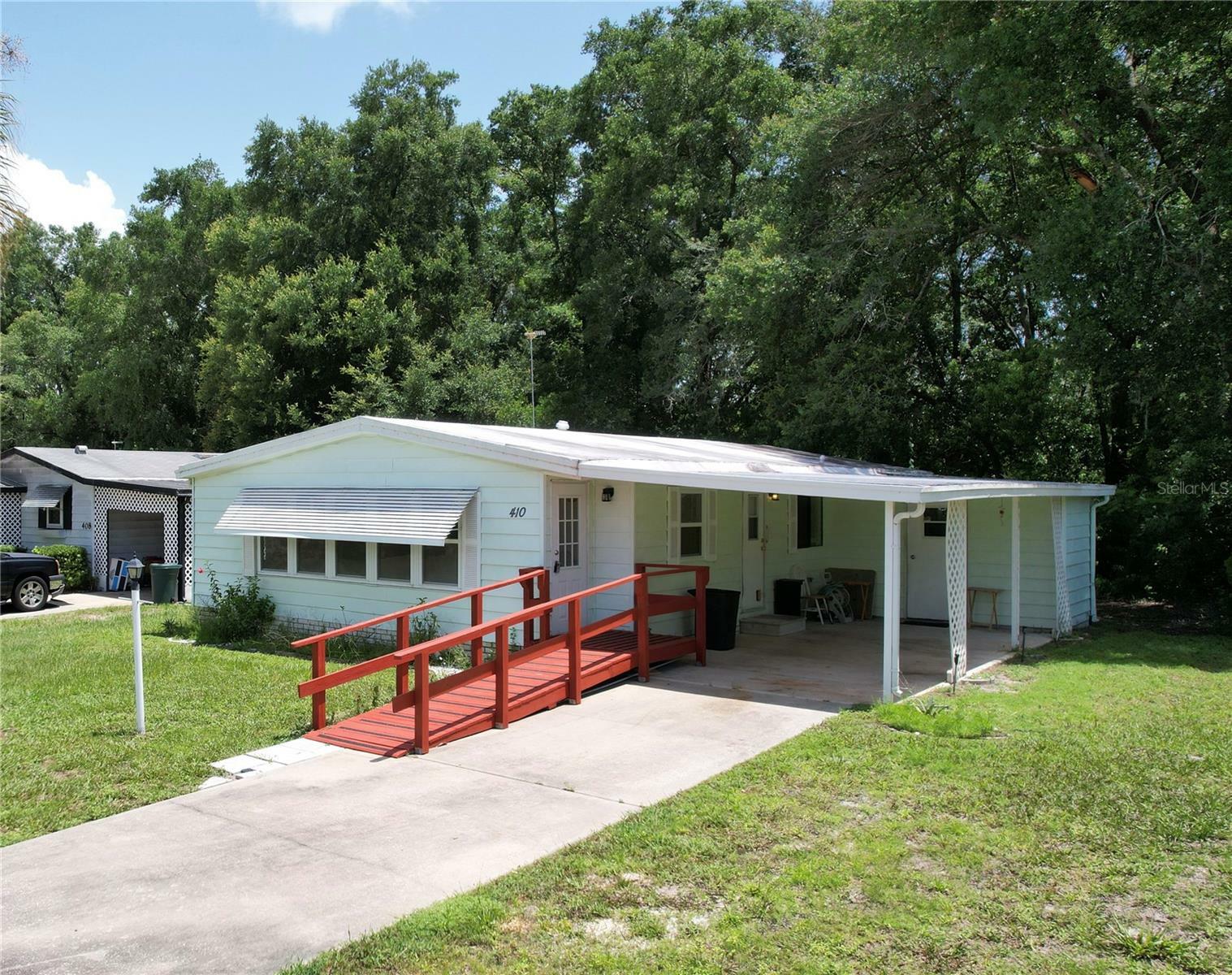 Property Photo:  410 Tarrson Boulevard  FL 32159 