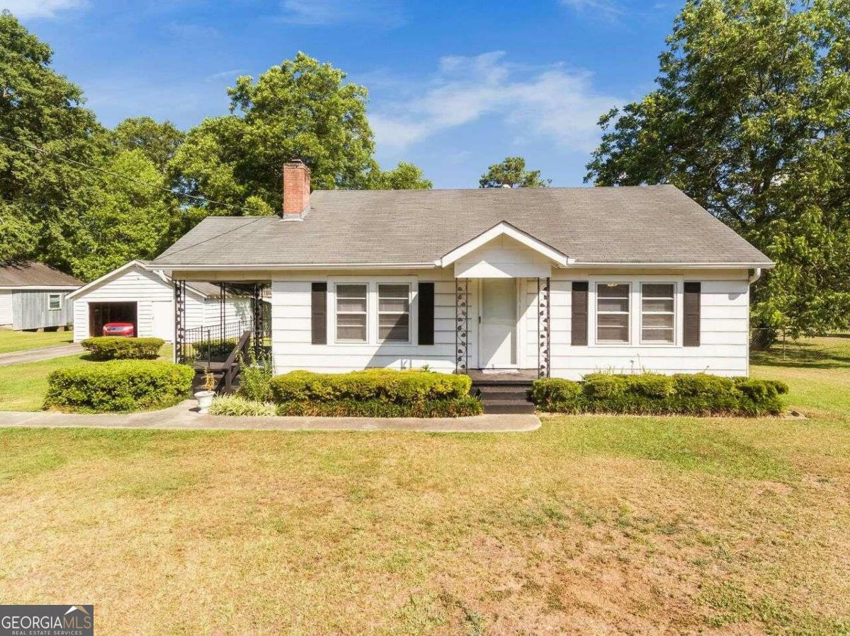 Property Photo:  116 Poplar Street  GA 30213 