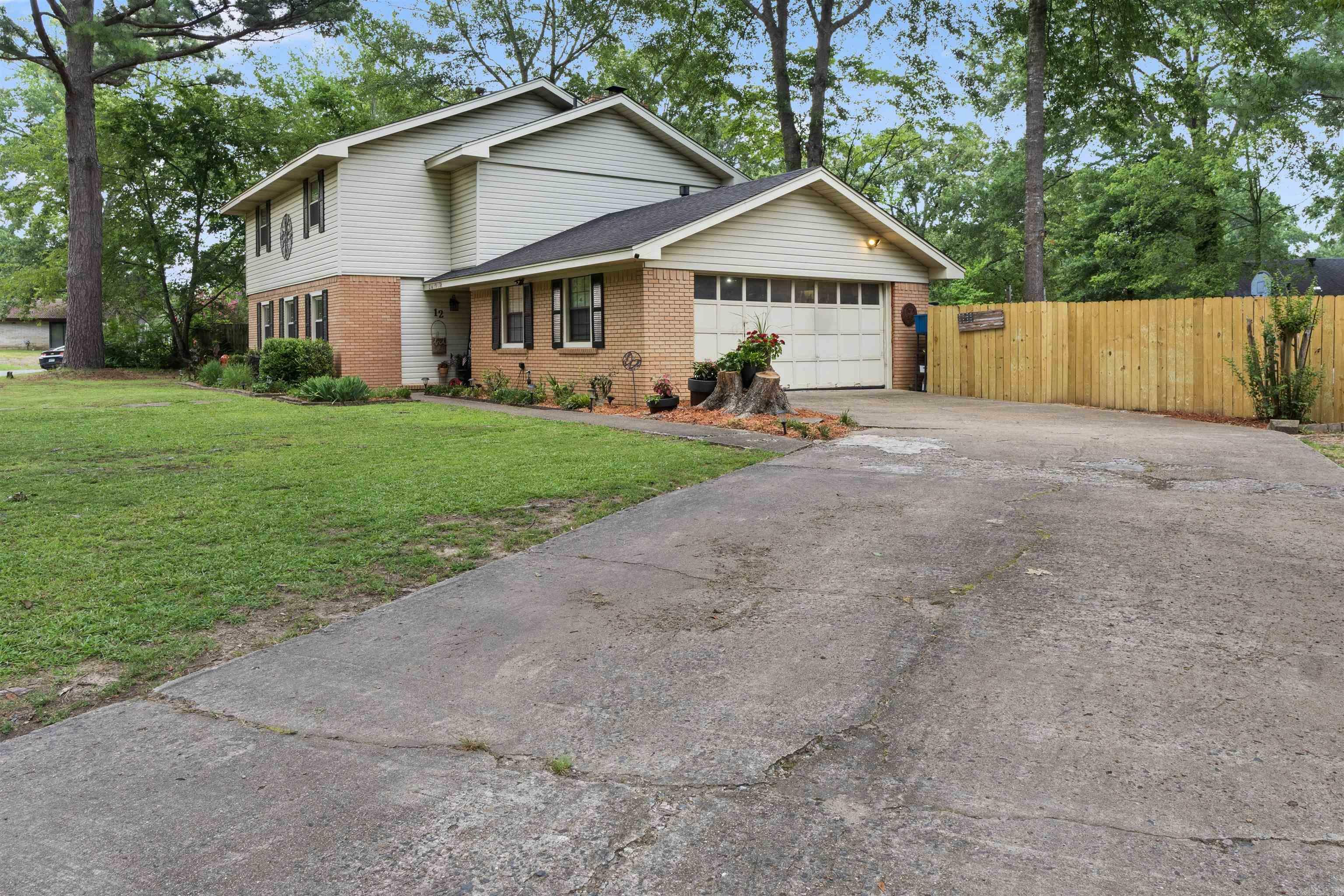 Property Photo:  12 W Post Oak Drive  AR 72034 