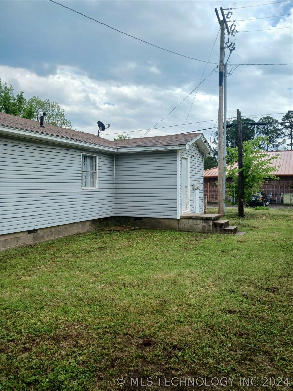 Property Photo:  205 NW 2nd  OK 74578 