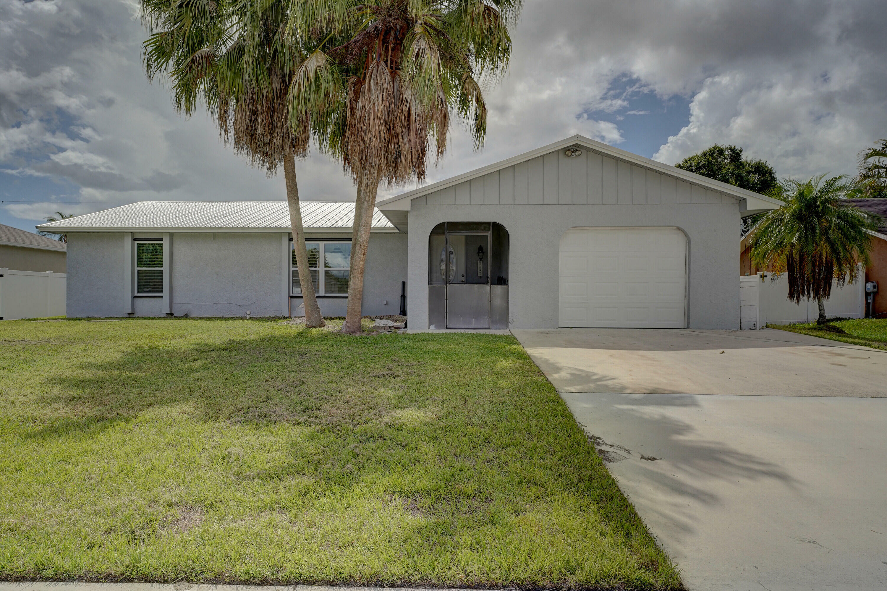 Property Photo:  1917 SE Floresta Drive  FL 34983 