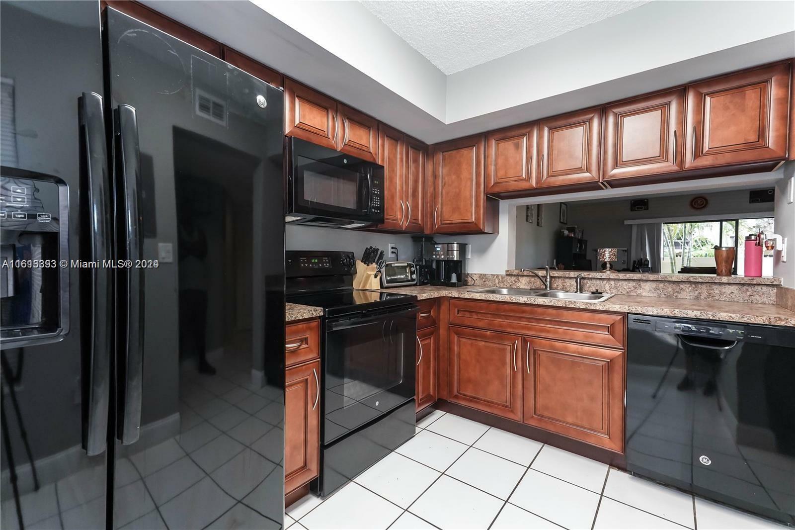 Property Photo:  12992 SW 88th Ln B102  FL 33186 