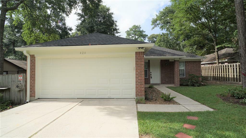 Property Photo:  424 Springwood Drive  TX 77385 