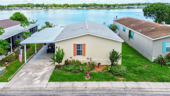 Property Photo: 8636 Fantasia Park Way FL 33578