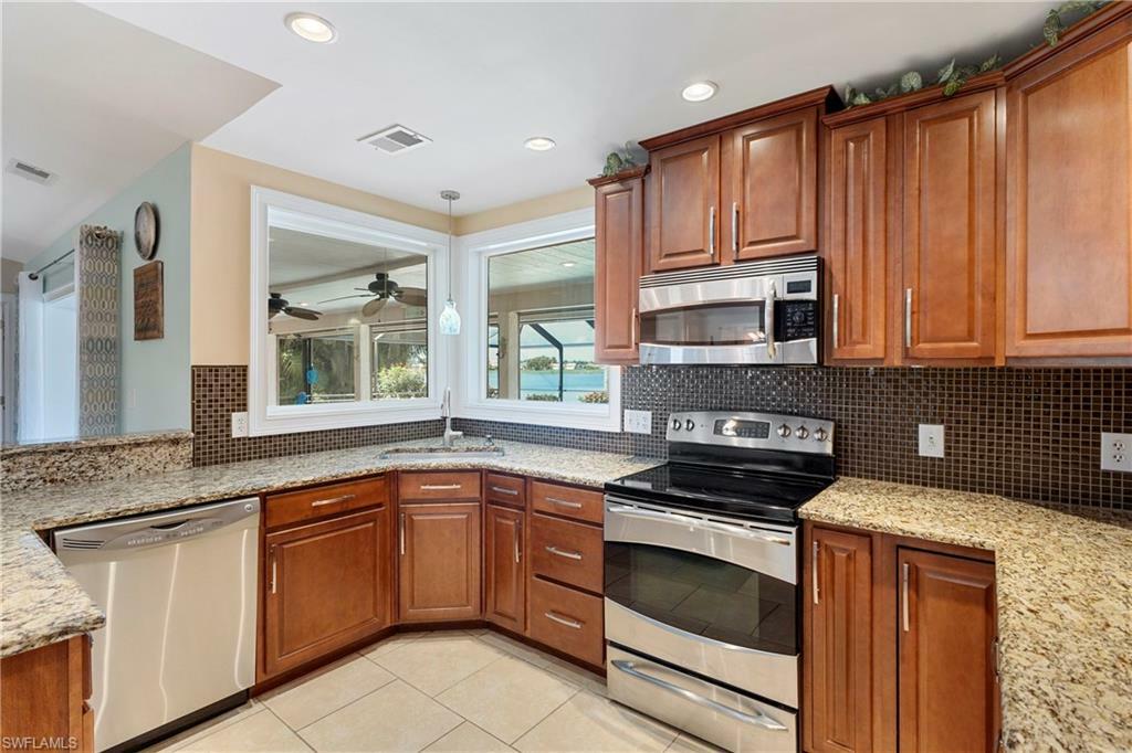 Property Photo:  18001 Royal Tree Pkwy  FL 34114 