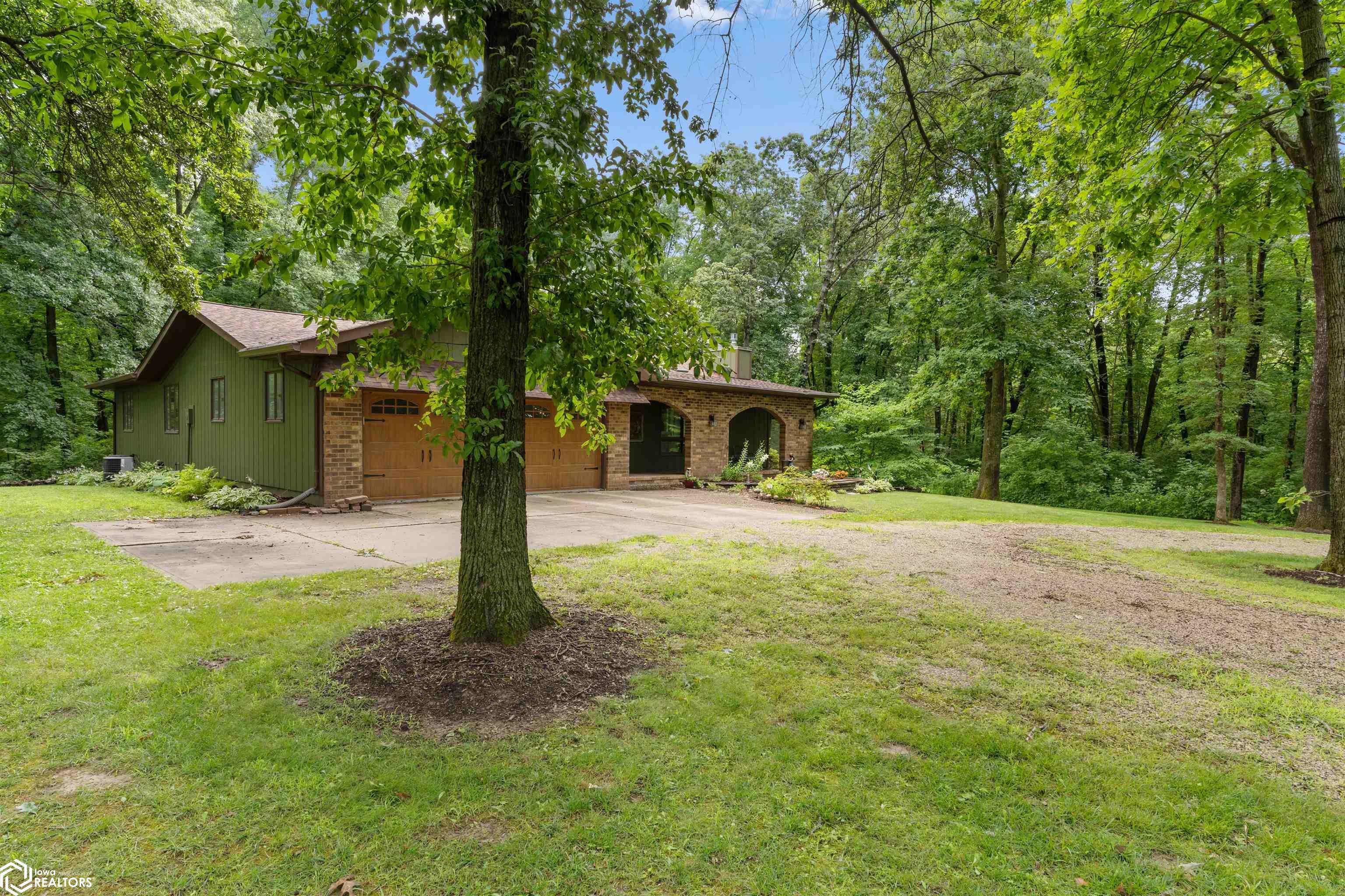 Property Photo:  5718 Hunt Road  IA 52601 