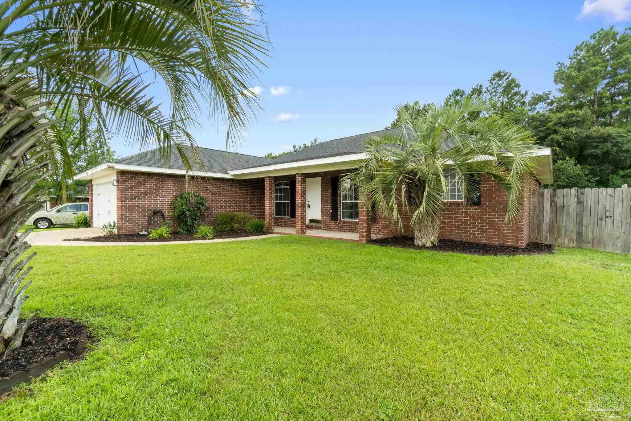 Property Photo:  7109 Woodside Rd  FL 32526 