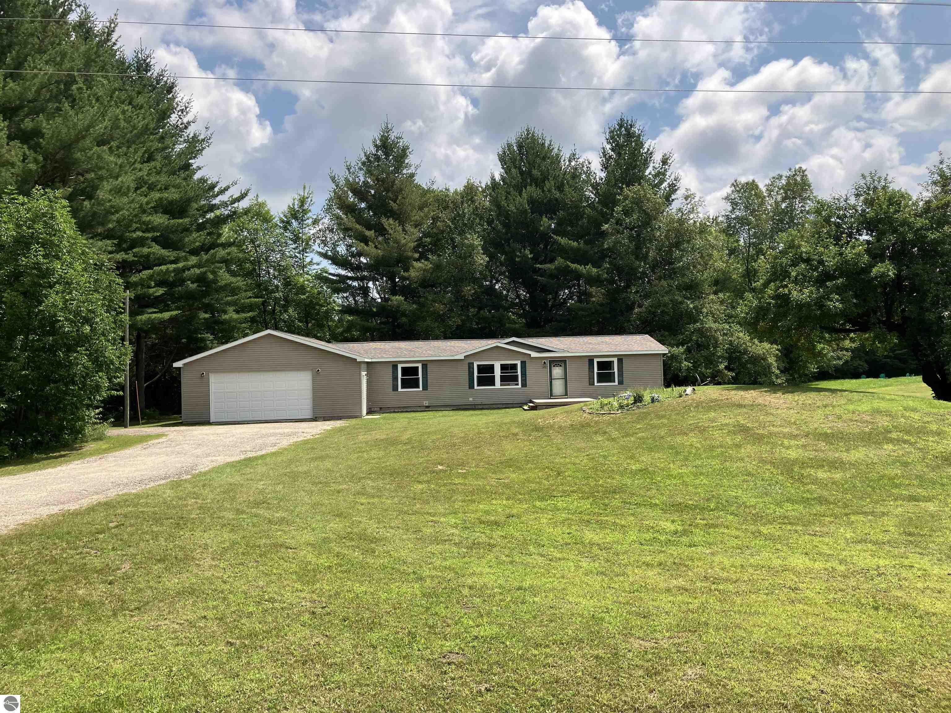 Property Photo:  9647 Shippy Road  MI 49633 