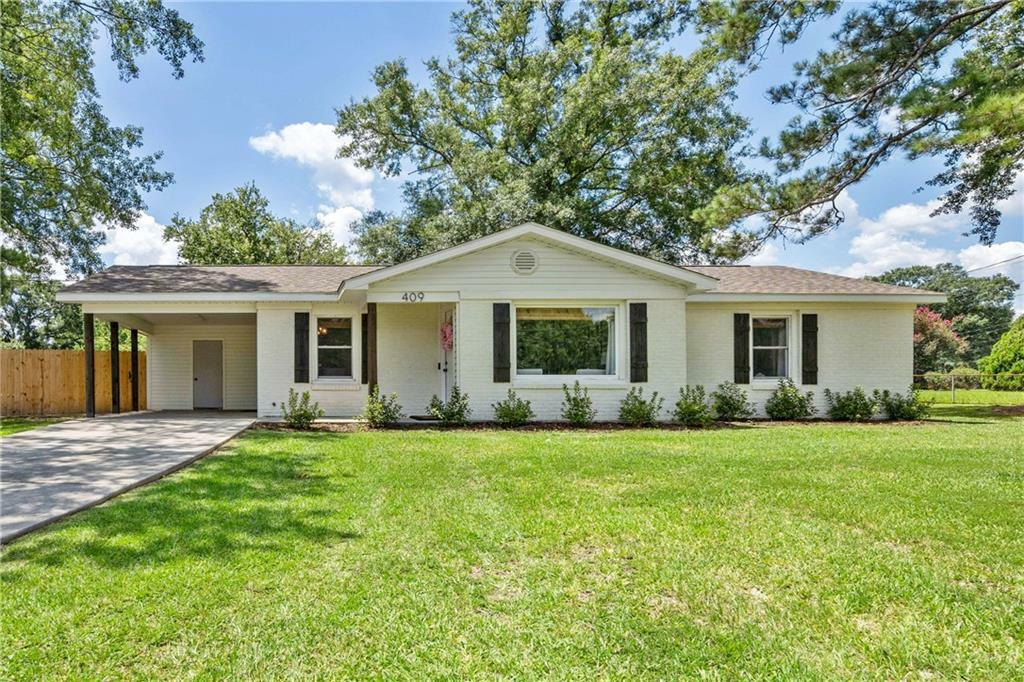 Property Photo: 409 International Boulevard AL 36571