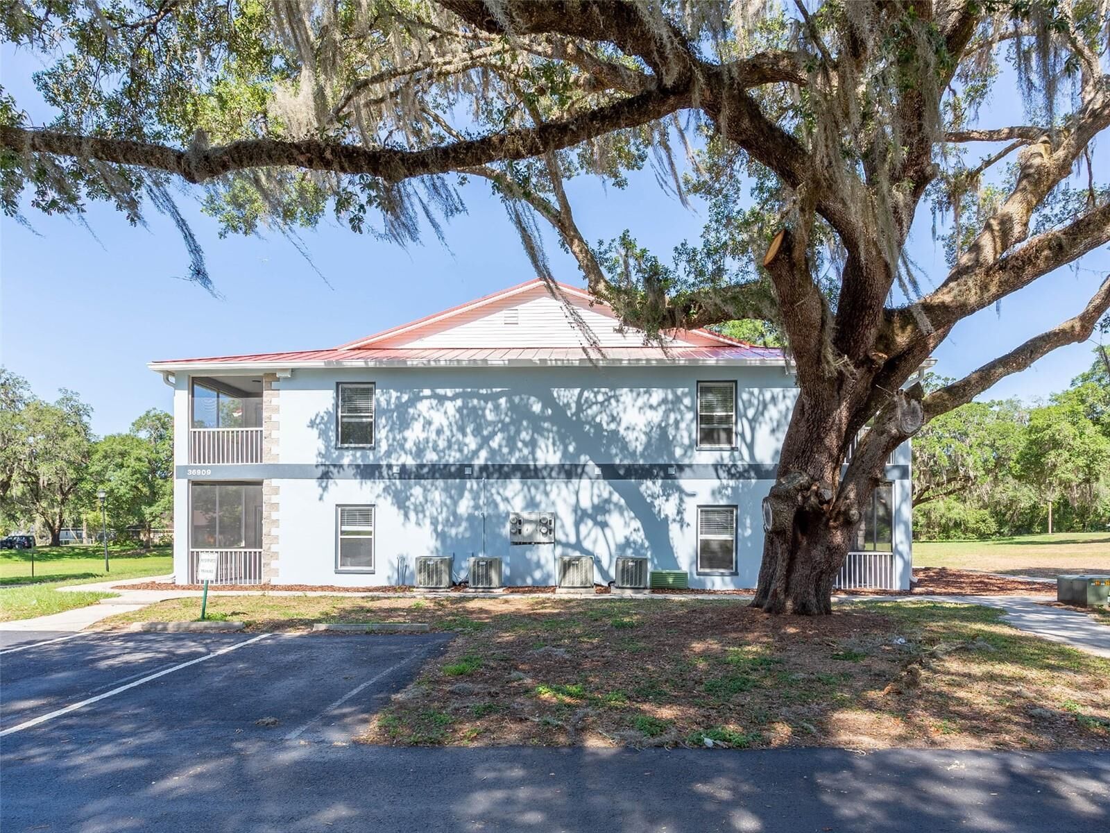 Property Photo: 36909 Value Cir 102 FL 33525
