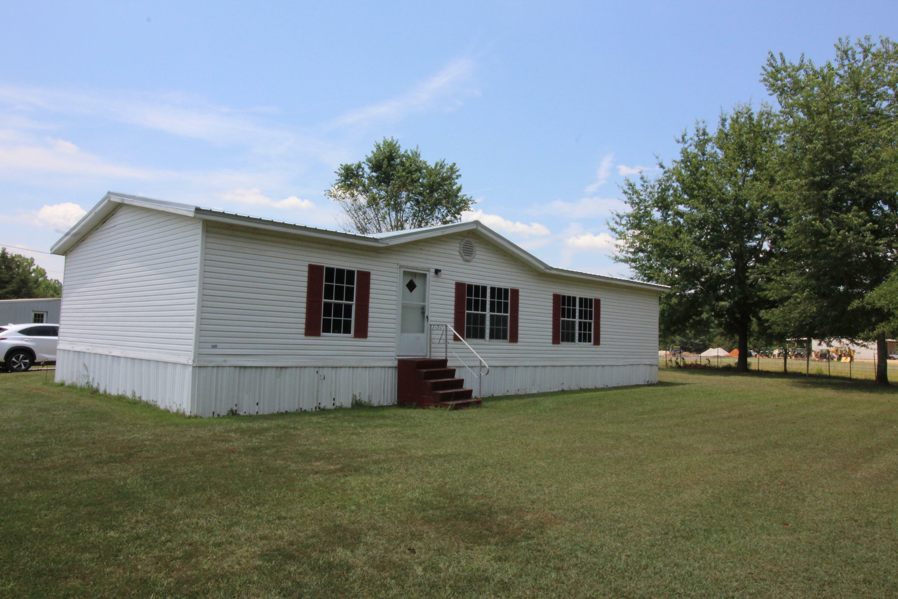 Property Photo:  869 Highway 145  MS 38824 