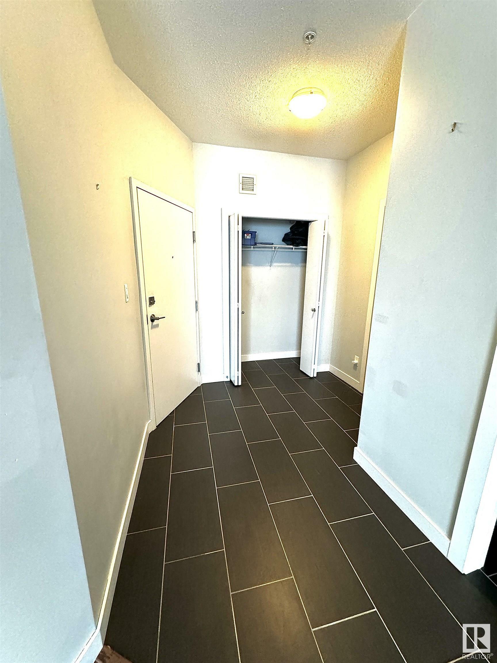 Property Photo:  10611 117 Street NW 412  AB T5H 0G6 