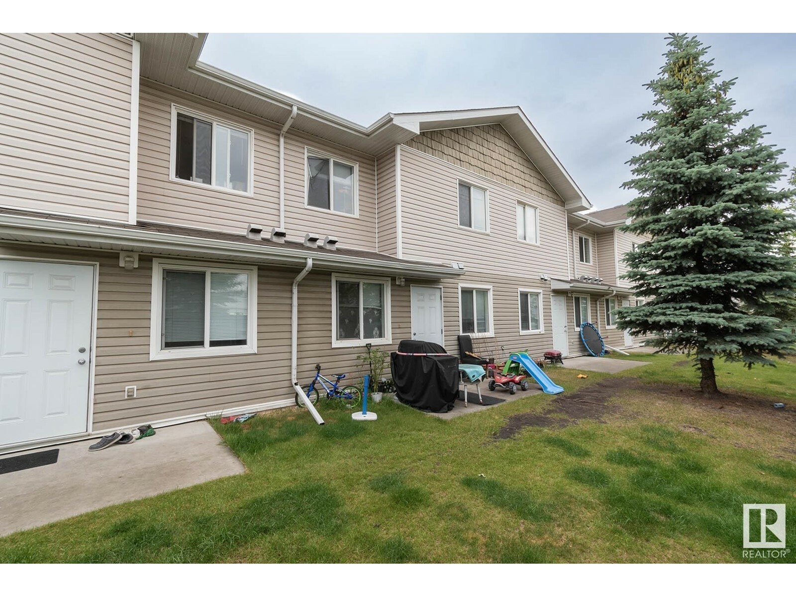 Property Photo:  #135 166 Bridgeport Bv  AB T9K 8K3 