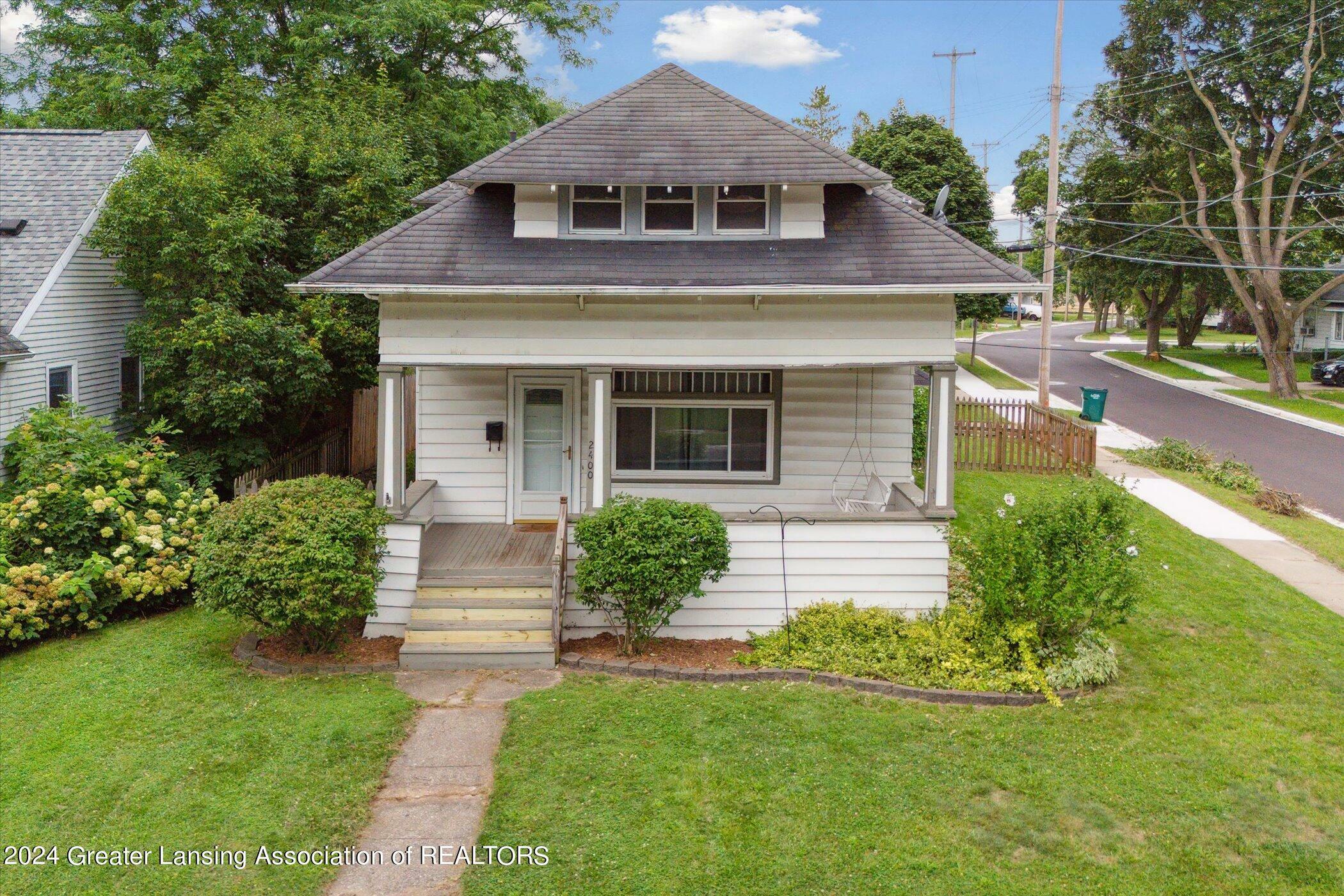 Property Photo:  2400 Strathmore Road  MI 48910 