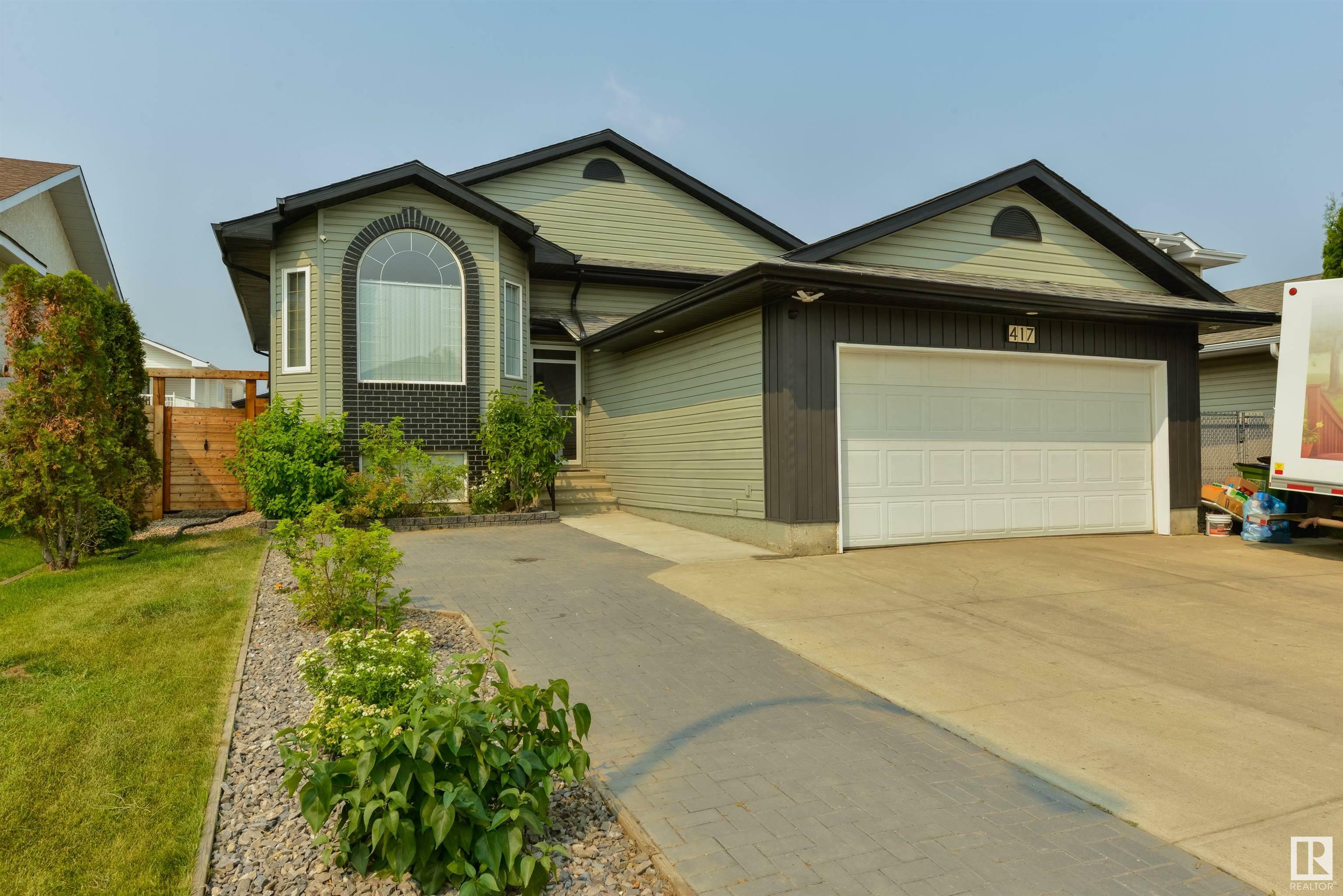 Property Photo:  417 Hollick-Kenyon Road NW  AB T5Y 2T9 