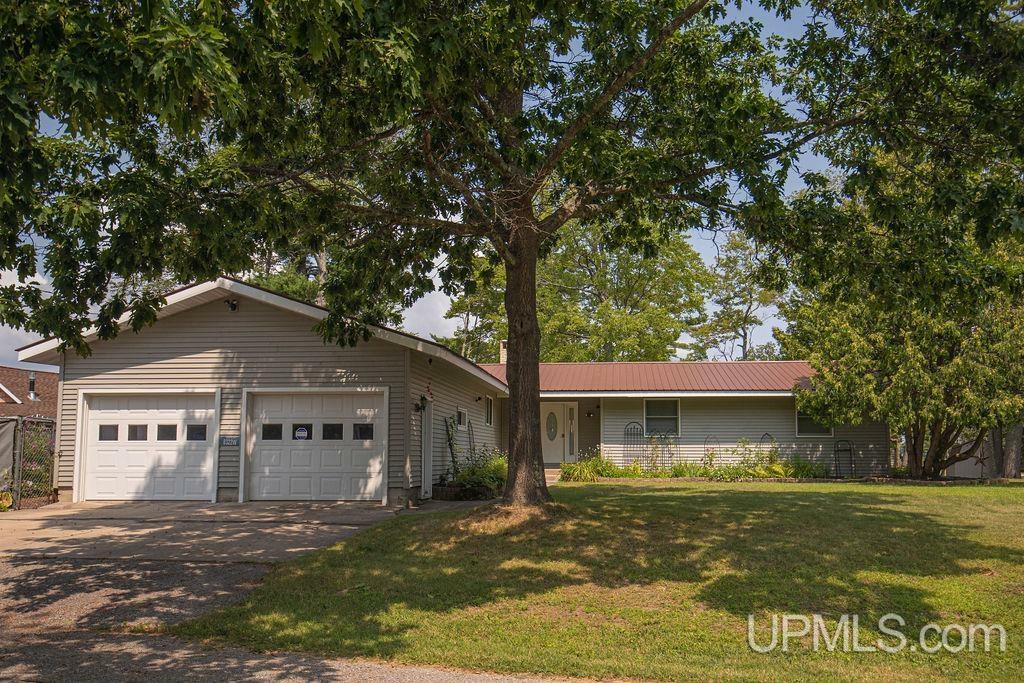 Property Photo:  8322N Washington Avenue  MI 49854 