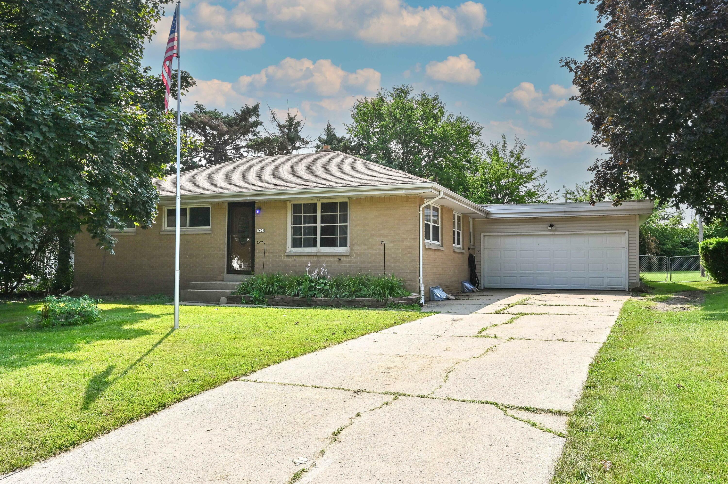 Property Photo:  7637 W Allerton Ave  WI 53220 