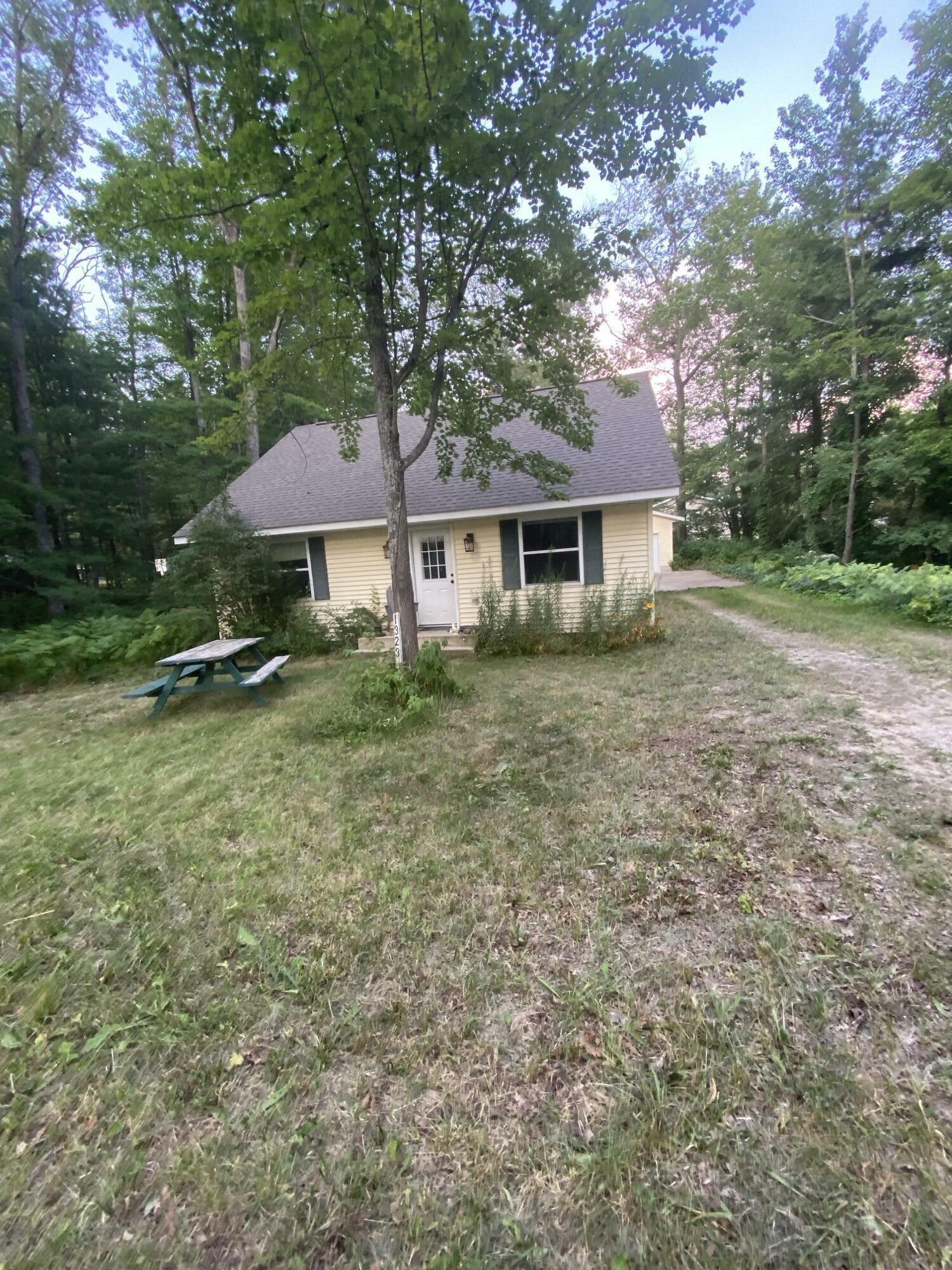 Property Photo:  1323 McIntyres Landing Road  MI 49738 