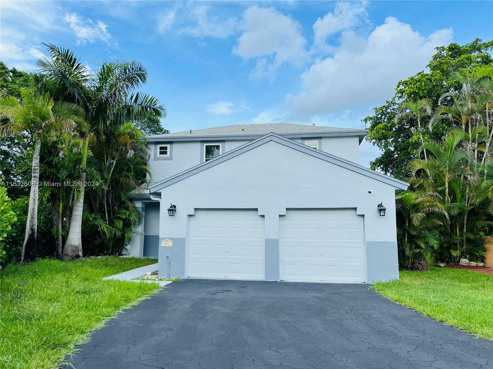 Property Photo:  381 NW 207th Ave  FL 33029 