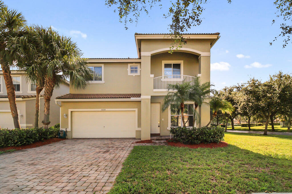 Property Photo:  6688 Lurais Drive  FL 33463 