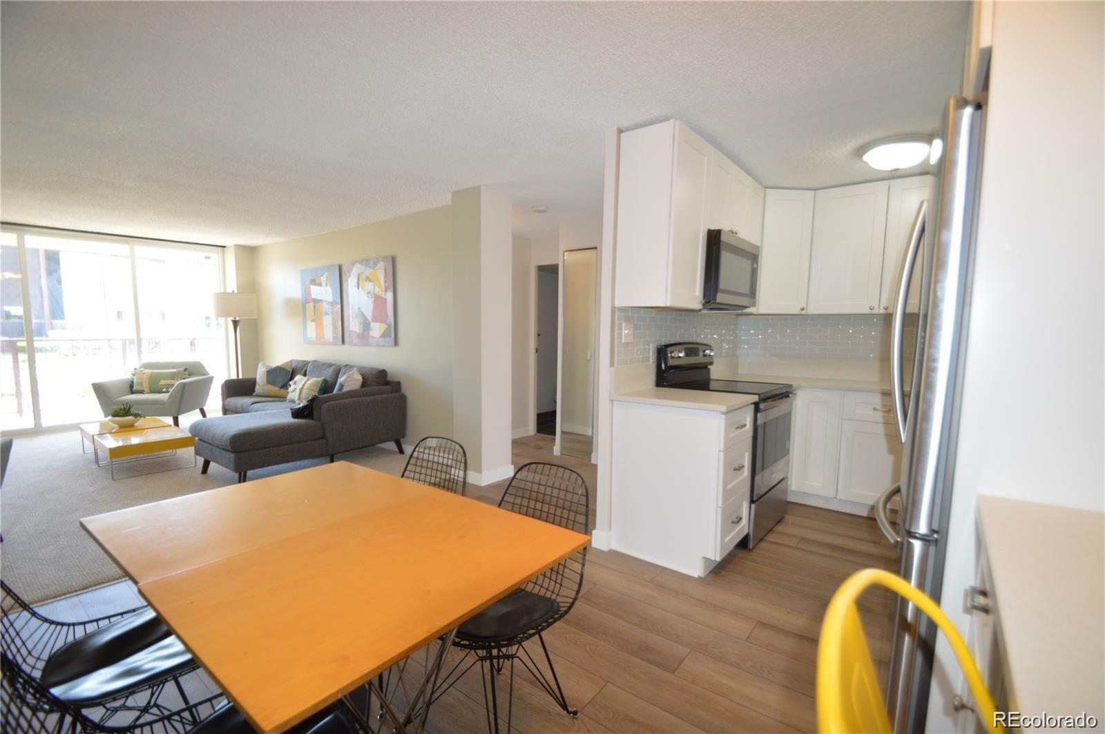 Property Photo:  2225 Buchtel Boulevard 202  CO 80210 