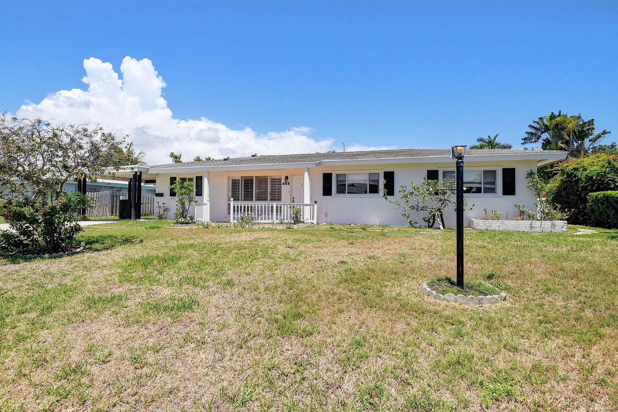 Property Photo:  455 NE 33rd Street  FL 33431 