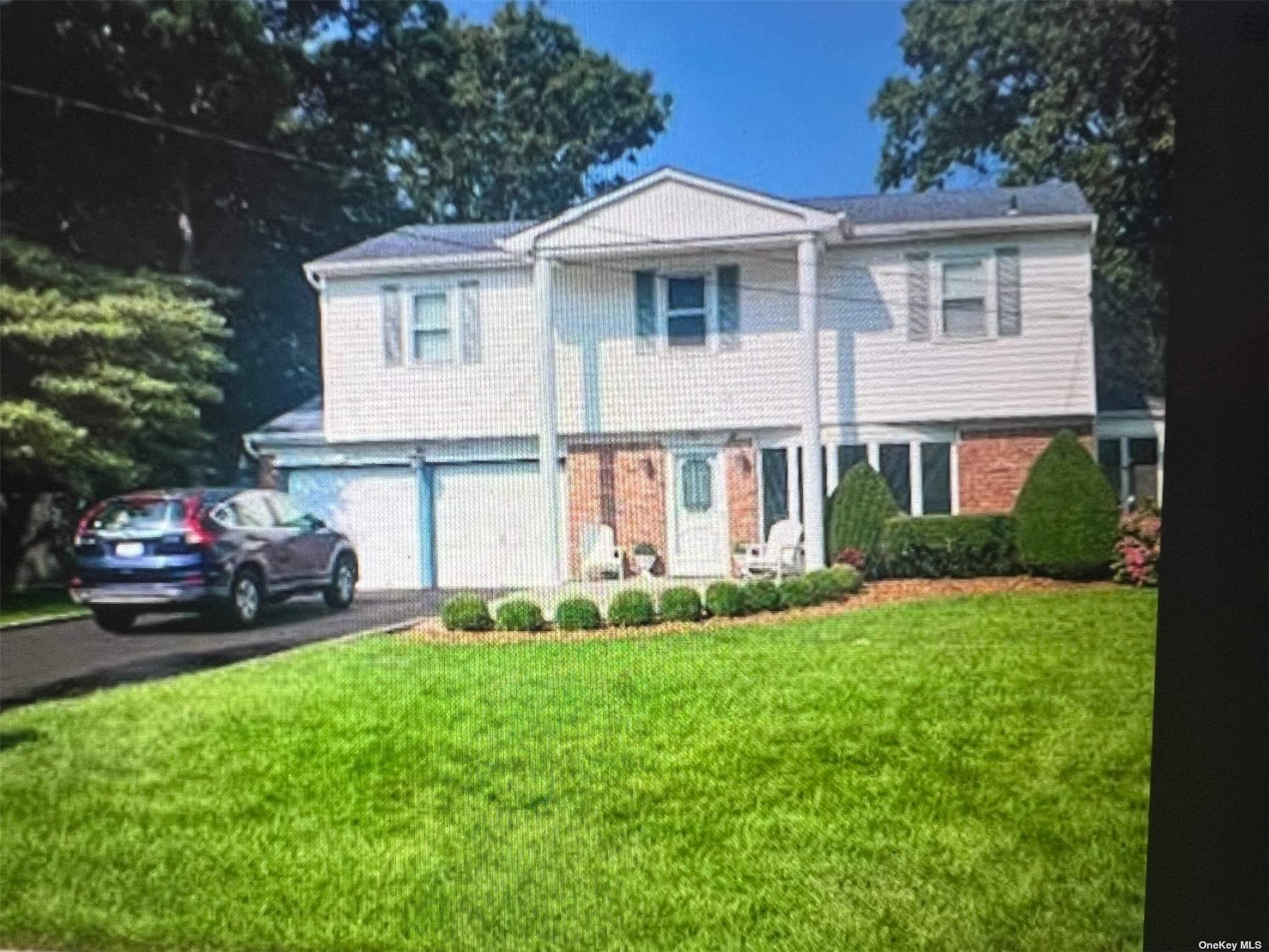 Property Photo:  70 Woodview Lane  NY 11720 